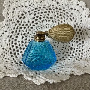 vintage I.W. Rice blue glass perfume bottle